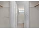 Walk-in closet with neutral carpet, open door and ample space at 10800 Fernando St, Orlando, FL 32825