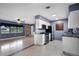 Open floor plan with a view from the living room to the kitchen at 10800 Fernando St, Orlando, FL 32825