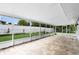 Enclosed patio with tile flooring and screened windows provides a nice outdoor living space at 10800 Fernando St, Orlando, FL 32825