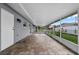 Spacious screened patio featuring tile flooring, offering a relaxing outdoor living space at 10800 Fernando St, Orlando, FL 32825