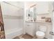 Bathroom with tiled shower-tub combination and wood look flooring at 1125 Lake Shadow Cir # 5308, Maitland, FL 32751