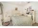 Brightly lit bedroom with neutral carpet and a decorative, paneled headboard at 1125 Lake Shadow Cir # 5308, Maitland, FL 32751