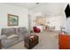 Comfortable living room featuring a spacious layout that seamlessly flows into the kitchen at 1125 Lake Shadow Cir # 5308, Maitland, FL 32751