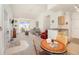 Open-concept living space with ample natural light, a living room, dining area, and partial kitchen view at 1125 Lake Shadow Cir # 5308, Maitland, FL 32751