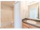 Bright bathroom with a large vanity, toilet, and a shower-tub combination at 1129 Royal Ridge Dr, Davenport, FL 33896
