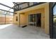 Covered patio with sliding glass doors provides seamless indoor/outdoor living, perfect for entertaining and relaxing at 1129 Royal Ridge Dr, Davenport, FL 33896