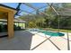 A beautiful screened-in pool and patio area, ideal for enjoying the outdoors in comfort and style at 1129 Royal Ridge Dr, Davenport, FL 33896