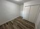 Clean bedroom with new floors, closet and neutral walls at 1130 W Lake Brantley Rd, Altamonte Springs, FL 32714