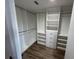 Spacious walk-in closet with custom shelving and drawers, offering ample storage at 1130 W Lake Brantley Rd, Altamonte Springs, FL 32714