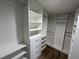 Bright walk-in closet featuring built-in shelving and drawer units, maximizing organization at 1130 W Lake Brantley Rd, Altamonte Springs, FL 32714