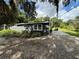 Charming exterior view of a home with gravel landscaping and a well-maintained yard at 1130 W Lake Brantley Rd, Altamonte Springs, FL 32714
