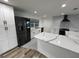 Beautiful updated kitchen with stainless appliances, quartz countertops, and ample storage space at 1130 W Lake Brantley Rd, Altamonte Springs, FL 32714