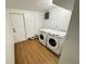Convenient laundry room features side-by-side washer and dryer, maximizing efficiency at 1130 W Lake Brantley Rd, Altamonte Springs, FL 32714