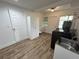 Bright laundry room with storage cabinets, a utility sink, and modern appliances at 1130 W Lake Brantley Rd, Altamonte Springs, FL 32714