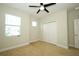 Bedroom with carpet, ceiling fan and a closet at 1222 Castlevecchio Loop, Orlando, FL 32825