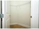 An empty walk-in closet with carpet flooring and wire shelving for organized storage at 1222 Castlevecchio Loop, Orlando, FL 32825