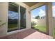 Brick patio with view of the fenced yard at 1222 Castlevecchio Loop, Orlando, FL 32825