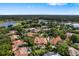 Breathtaking aerial view of luxury homes with serene lakes and golf course views at 1274 Prince Ct, Lake Mary, FL 32746