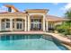 Stunning backyard featuring a sparkling pool, creating a perfect outdoor retreat at 1274 Prince Ct, Lake Mary, FL 32746