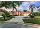 Well-maintained home with circular driveway and lush landscaping providing great curb appeal at 1274 Prince Ct, Lake Mary, FL 32746