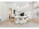 Bright kitchen featuring a large island, modern appliances, and an arched doorway at 1274 Prince Ct, Lake Mary, FL 32746