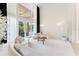 Bright living room boasting high ceilings, large windows, and modern, curved sofas at 1274 Prince Ct, Lake Mary, FL 32746