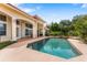 Sparkling pool with adjacent patio, creating a perfect oasis for relaxation and entertainment at 1274 Prince Ct, Lake Mary, FL 32746