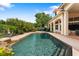 Inviting pool area, perfect for outdoor fun and relaxation, set against a backdrop of lush greenery at 1274 Prince Ct, Lake Mary, FL 32746