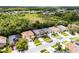 Aerial view showing home with screened pool, landscaping, and location in the neighborhood at 13431 Early Frost Cir, Orlando, FL 32828