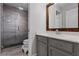 Bathroom features a sleek, glass-enclosed shower and stylish vanity with modern fixtures at 13431 Early Frost Cir, Orlando, FL 32828