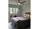 Charming bedroom with grey walls, neutral accents, and a window seat at 1420 Knollwood St, Orlando, FL 32804