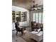 Bright living room showcasing built-in shelving, comfortable seating, and stylish decor with natural light at 1420 Knollwood St, Orlando, FL 32804