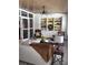 Cozy living area featuring built-in shelving, comfortable seating, and a bright and inviting atmosphere at 1420 Knollwood St, Orlando, FL 32804