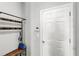 Neutral entryway with a coat rack and door at 15577 Willow Arbor Cir, Orlando, FL 32824