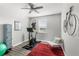 Exercise room with stationary bike, weights, and fitness accessories creating a dedicated workout space at 15577 Willow Arbor Cir, Orlando, FL 32824