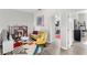 Bright loft featuring a small seating area and colorful decor at 15577 Willow Arbor Cir, Orlando, FL 32824