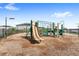 Community playground providing children a safe and fun environment for outdoor activities at 15577 Willow Arbor Cir, Orlando, FL 32824