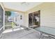 A screened lanai offering outdoor living space and protection from insects at 17097 Se 96Th Chapelwood Cir, The Villages, FL 32162