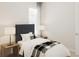 Cozy bedroom featuring a twin bed, a neutral color scheme, and natural light from a single window at 1993 Beach Ter, Celebration, FL 34747