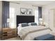Comfortable primary bedroom with a dark upholstered headboard, soft blue accents, and access to an ensuite bathroom at 1993 Beach Ter, Celebration, FL 34747