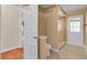 Bright bathroom boasts a glass shower, white doors and tan walls at 202 Riverview Dr, Longwood, FL 32779