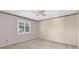 Bedroom featuring carpeted floors, and a bright window at 202 Riverview Dr, Longwood, FL 32779