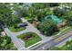 An aerial view of the residential community's entrance and manicured landscaping, with recreational facilities at 202 Riverview Dr, Longwood, FL 32779