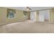The primary bedroom features neutral carpet and window with a view at 202 Riverview Dr, Longwood, FL 32779