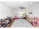 Large, bright bonus room with ceiling fan, play structures, and plenty of open space at 20796 Quinn St, Orlando, FL 32833