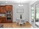 Charming dining area with views of the back yard, and stainless appliances nearby at 20796 Quinn St, Orlando, FL 32833