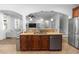 Beautiful kitchen island with stainless steel sink and dishwasher overlooking the living room at 20796 Quinn St, Orlando, FL 32833