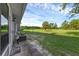 Spacious backyard with mature tree, large grassy area, and partial shade at 2206 Stonington Ave # 2206, Orlando, FL 32817