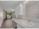 Bathroom featuring vanity with marble countertops, and a view into the bedroom at 2206 Stonington Ave # 2206, Orlando, FL 32817