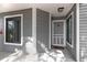 Exterior front door with large window on either side at 2206 Stonington Ave # 2206, Orlando, FL 32817